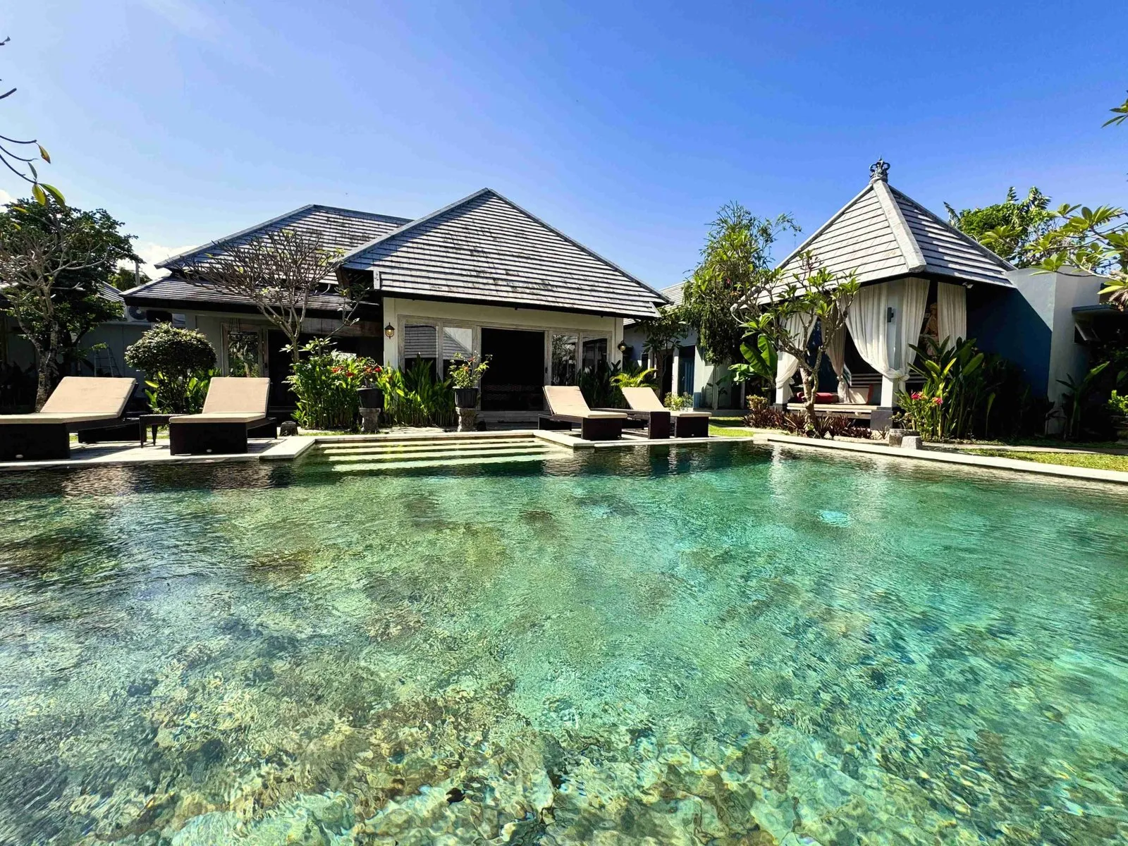 SEASIDE VILLA WITH LUSH SURROUNDINGS AND INVITING FEATURES IN SANUR